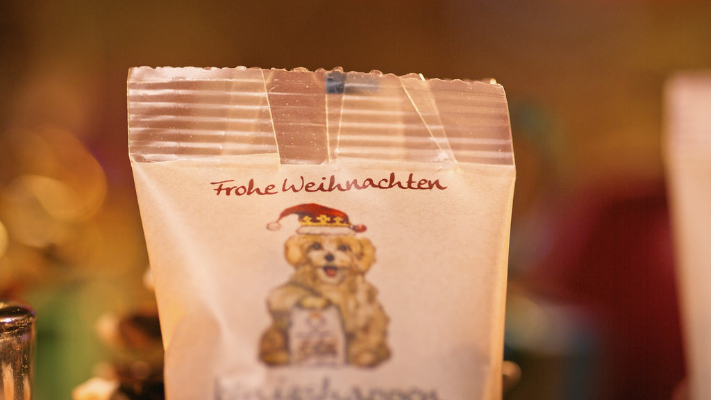 Königshappen Weihnachtsedition – Detail „Frohe Weihnachten“ auf dem Tütchen